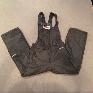 SkiGear black kids bib with adjustable suspenders for easy sizing